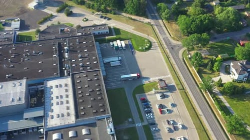 Aerial view of goods warehouse. Logistics center in industrial city zone from above. Aerial view of