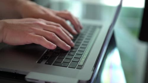 Businessman using laptop technology working from home