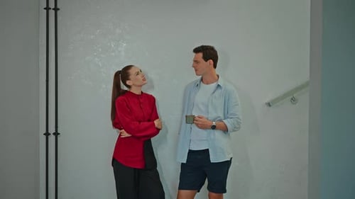 Young adults talking in a brightly lit room