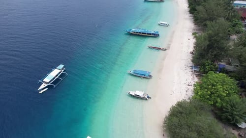 View from above with several boats on the beach