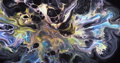 Ink space. Abstract Colorful Ink Spread Art. On a black background, divergent blue, yellow and white