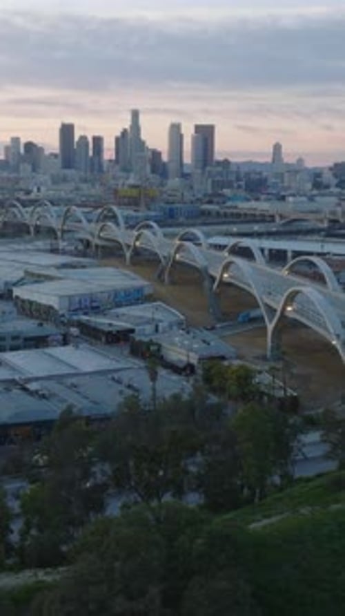 Aerial Panoramic Twilight View of 6Th Street Viaduct and Downtown Skyscrapers in Background Los