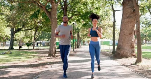 Fitness, running and black couple in park for exercise, cardio and bonding in nature together