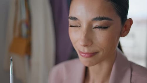 Winking Woman Enjoying Makeup Routine at Home Closeup Lady Applying Lipstick