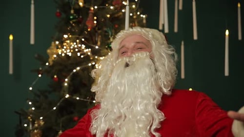 Santa Claus Portrait In Front of Christmas Tree