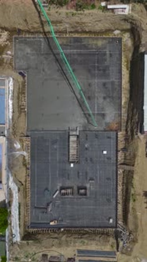 New Building Foundation Poured at Construction Site