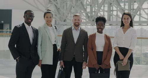 Portrait of Happy Businesspeople Men and Women Smiling in Office Center Lobby