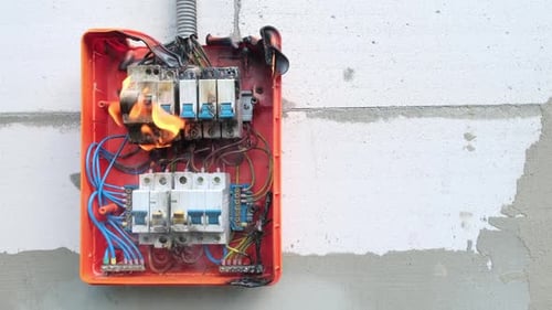 Electrical Short Circuit Fire Hazard in Orange Box