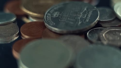 video of vintage rare coins, retro money edition, old gold, on a 360 rotating plate, 120 fps slow mo