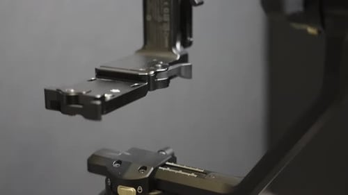 Close Up of Camera Gimbal on Gray Background