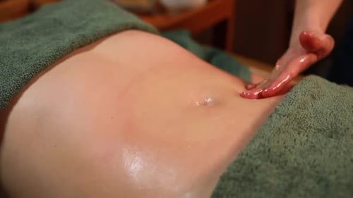 Person Receiving Back Massage at the Spa