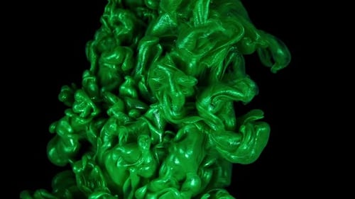 Ink Symphony SlowMotion Green Ink Drops Create an Abstract Dance of Colors on a Black Canvas