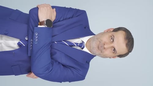 Man in Blue Suit with Arms Crossed Portrait