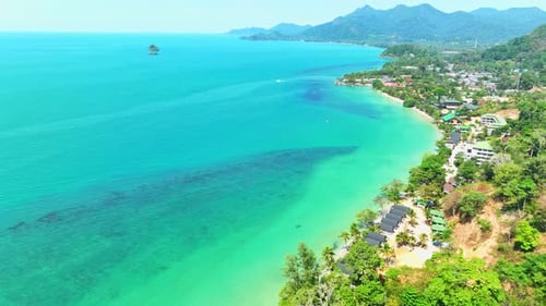 Aerial view of a tropical coastline with stunning beaches in Thailand. 4K.