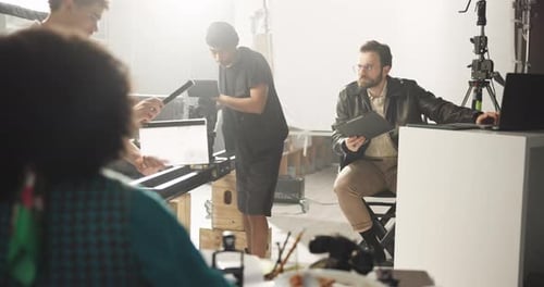 Film Crew Working on Set in Studio