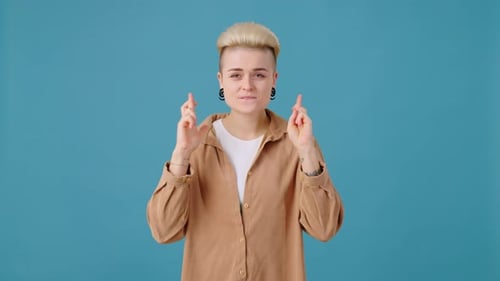 Female in Pose of Seeking Help From God Rejoices in Studio