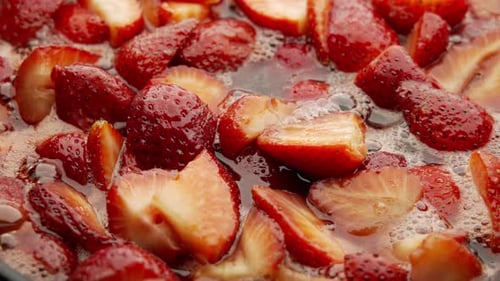 Close up of Strawberries Cooking in Sauce