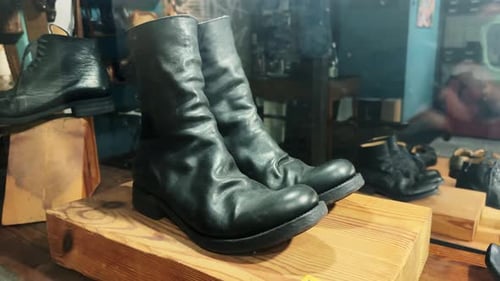 Closeup of New Boots on a Shelf Shop for Handmade and Vintage Shoes