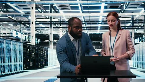 Server Hub Engineering Team Using Laptop to Monitor Power Consumption