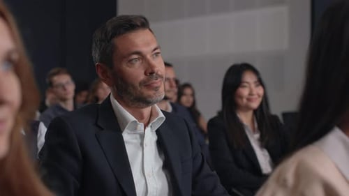 Group of People Listens Speech at Business Conference. Stage Talk at Summit