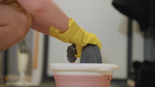 House Cleaning Scene Woman Washing Sponge with Care Close Up of Hands Cleaning with Sponge Domestic