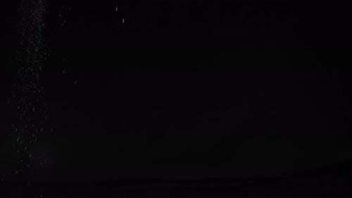 Baseball Rises Through Explosion of White Powder