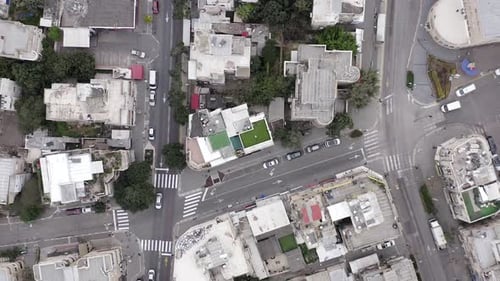 Top down aerial view of rooftops and empty streets of a local town during Corona Virus lockdown