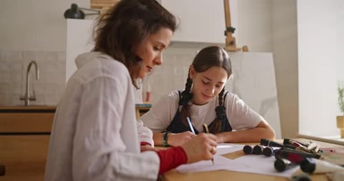 The Process of Learning to Draw a Woman Teacher Shows How to Draw in the Drawing Room During a
