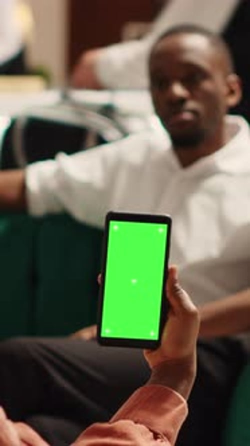 Vertical Video Chroma Key Smartphone in Hotel Lounge