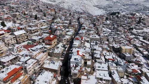 City houses covered with snow, Aerial view