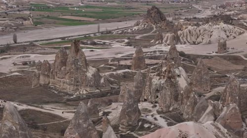 Desert Landscape with Rock Formations in Daytime