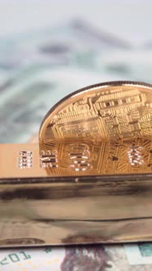Rotating gold bar, bitcoin, 100-dollar bill on a white background