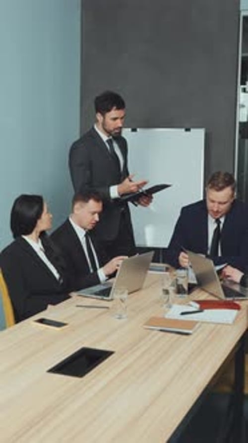 Business Team Meeting in Modern Office