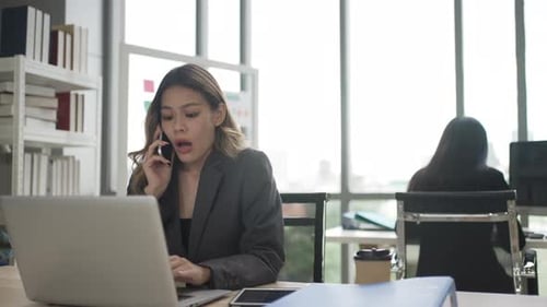 White collar workers are working with team at office.