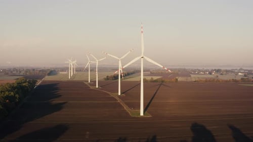Aerial View Wind Farm or Wind Farm with Tall Wind Turbines for Generating