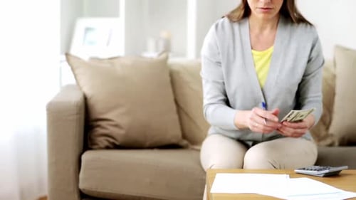 Business, Savings, Finances And People Concept - Woman With Papers And Calculator Counting Money ...