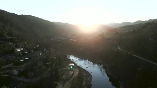 Aerial View of a Beautiful River Captured at Sunset