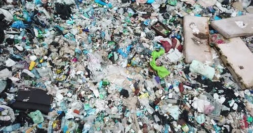 Aerial View of Overfilled Landfill Site with Plastic Waste