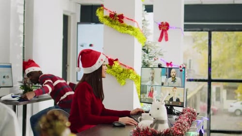 Worker Videocall in Xmas Office
