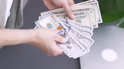 Close Up Woman Hands Counting Cash Money 1000 American Dollars Banknotes Income Winner and Business