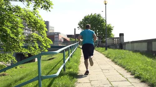 Young, Sporty Man Jogging in the City, Super