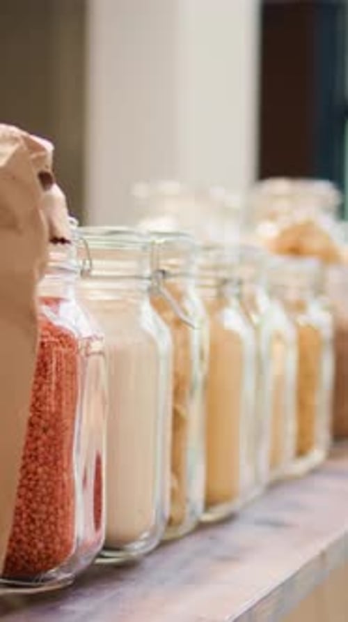 Pantry with Grains and Pasta in Glass Jars