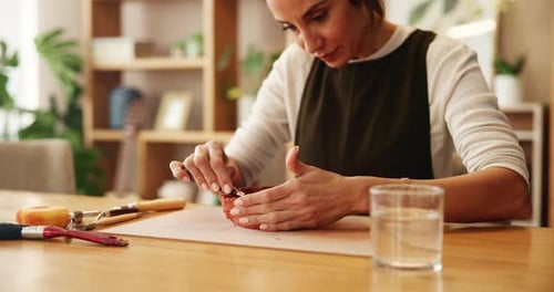Woman, pottery and clay as designer or artist in studio for project, home decor and handmade craft