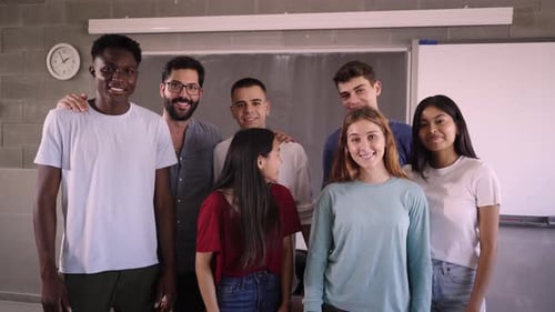 Group of People Smiling in a Classroom