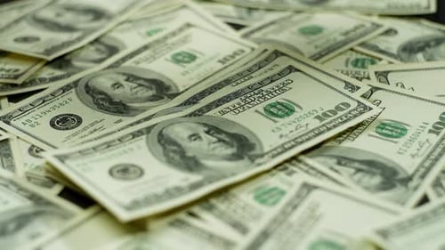 Pile of One Hundred Dollar Bills