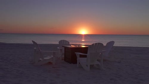 Romantic Table on the Beach Set for Two at Sunset, Tracking