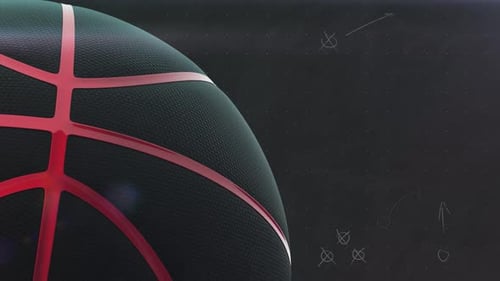 Collection Game Time : Un élément de transition représentant un gros ballon de basket noir avec un motif rouge apparaissant sur un