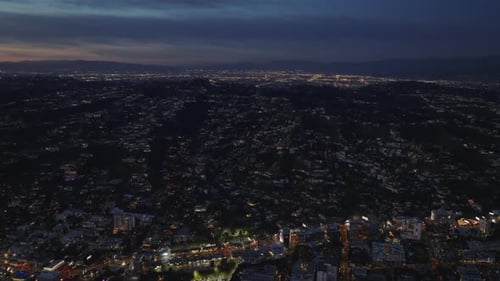 Aerial Panoramic Footage of City at Night Houses in Residential Urban Borough in Hills