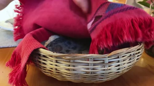 Closeup Shot of a Hand Showing Tortillas Mexican Traditional Food Inside Basket
