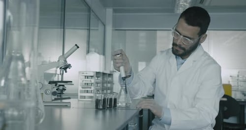 Scientist Conducting Plant Experiment in Laboratory